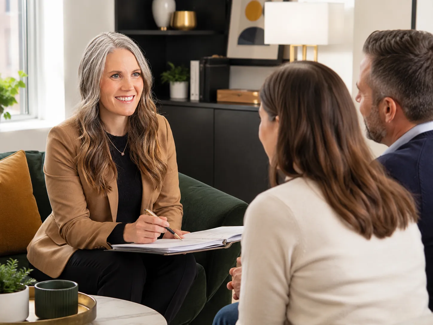 Cooper Norman business advisor leading a client strategy discussion.