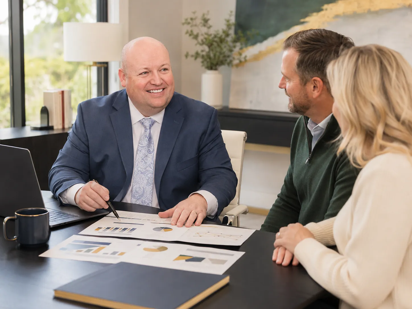 Cooper Norman senior CPA leading a business advisory conversation with clients.